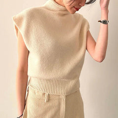 Women's sleeveless turtleneck sweater with ribbed detail