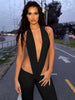 Trendy Irregular Hollow Bandage Halter Deep V-Neck Skinny Stretch Jumpsuits